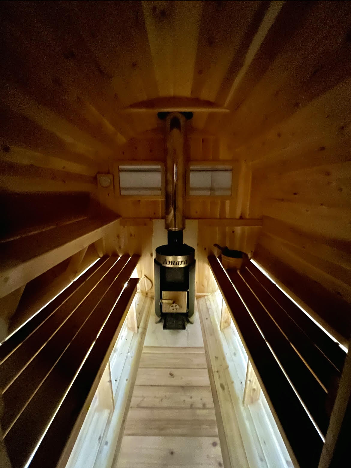 Amara Mood Lighting is two sets of solar lights, installed into an Amara Sauna, supplying your outdoor barrel sauna with a warm moody aesthetic.